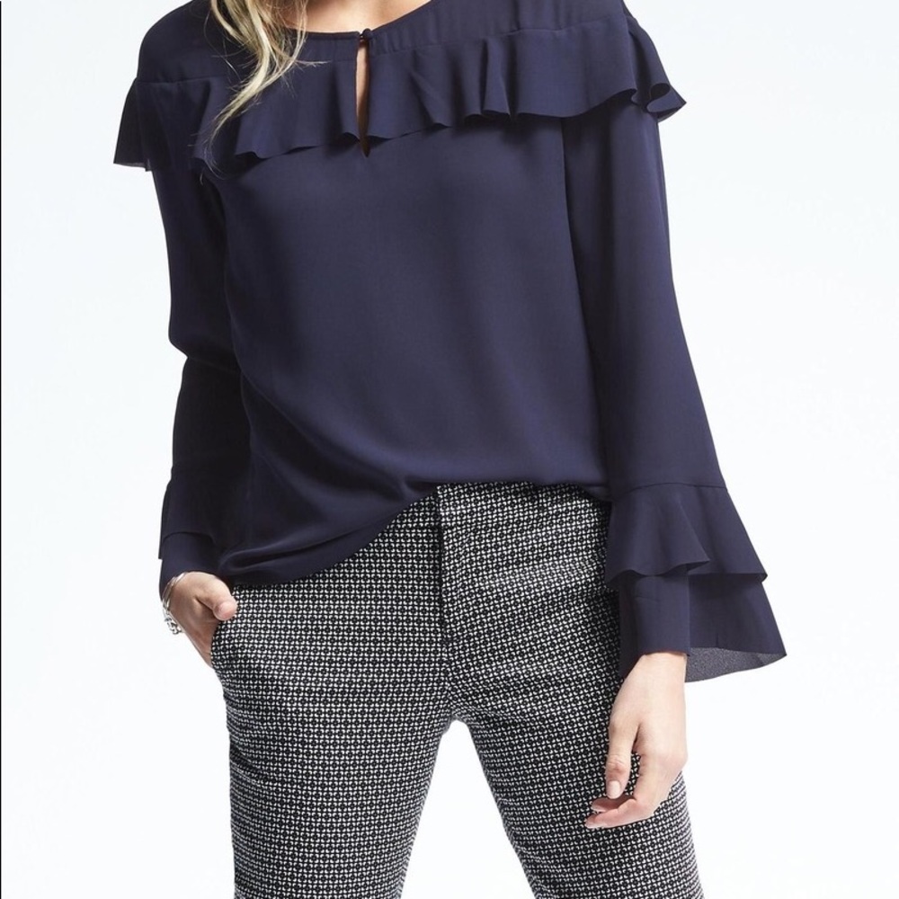Navy long sleeve flounce top